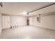Spacious two-car garage featuring epoxy floors, ample lighting, and room for storage at 27260 Porto Nacional Dr, Punta Gorda, FL 33983