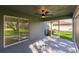 Screened patio with view of lawn and landscaping, offering a relaxing outdoor space at 27260 Porto Nacional Dr, Punta Gorda, FL 33983