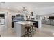 Bright kitchen with stainless appliances, granite countertops, and modern pendant lighting fixture at 280 Belvedere Ct, Punta Gorda, FL 33950