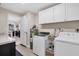 Functional laundry room with modern appliances and ample storage space at 280 Belvedere Ct, Punta Gorda, FL 33950