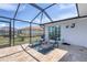 Inviting screened lanai with comfortable lounge chairs perfect for relaxation and enjoying the outdoors at 280 Belvedere Ct, Punta Gorda, FL 33950