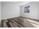 Bright and airy bedroom with luxury vinyl plank flooring and a large window at 3297 Swanee Rd, Punta Gorda, FL 33980