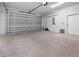 Spacious two-car garage with ample space for parking and storage at 3297 Swanee Rd, Punta Gorda, FL 33980