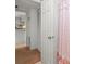 Bright bathroom features a shower with decorative coral-themed shower curtain at 3310 Loveland Blvd # 1906, Punta Gorda, FL 33980