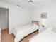 Bright and airy bedroom with two beds, featuring a closet, and a clean, simple style at 3310 Loveland Blvd # 1906, Punta Gorda, FL 33980