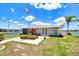 Charming clubhouse with flag and water views, perfect for gatherings at 3310 Loveland Blvd # 1906, Punta Gorda, FL 33980