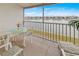 Enjoy lake views from this screened patio, perfect for outdoor dining at 3310 Loveland Blvd # 1906, Punta Gorda, FL 33980