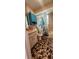 Bathroom featuring vanity, a shower/tub combo with ocean themed curtain at 3357 Vassar St, Port Charlotte, FL 33980
