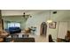 Vaulted ceilings and open floor plan in the living room create a welcoming and comfortable space at 3357 Vassar St, Port Charlotte, FL 33980