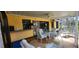 Cozy covered patio with comfortable seating, creating an inviting outdoor living space at 3357 Vassar St, Port Charlotte, FL 33980