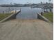 Community boat ramp featuring dock and easy water access for enjoying waterfront activities at 354 Blackburn Blvd, North Port, FL 34287