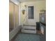 Inviting entrance area leading to the home, with an adjacent screened porch at 354 Blackburn Blvd, North Port, FL 34287