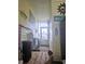 Enclosed entryway with beachy decor, chairs, and a view of the outdoors at 354 Blackburn Blvd, North Port, FL 34287