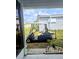 Blue golf cart parked near a well-maintained home at 354 Blackburn Blvd, North Port, FL 34287