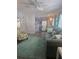 Bright living room with cozy furniture, soft lighting and coastal accents that create a relaxed vibe at 354 Blackburn Blvd, North Port, FL 34287