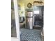 View from porch, featuring refrigerator and beach-themed decor at 354 Blackburn Blvd, North Port, FL 34287