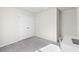 Spare bedroom featuring plush carpet, a double closet, and a dedicated desk space at 401 Calendar St, Port Charlotte, FL 33954
