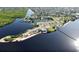 Beautiful aerial view of a waterfront neighborhood with access to a bay at 4168 Harbor Blvd, Port Charlotte, FL 33952