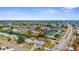 Aerial shot of the property showing the neighborhood, canal access, and the layout of the residential area at 4168 Harbor Blvd, Port Charlotte, FL 33952