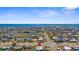 Expansive aerial view of the neighborhood featuring the property with the pool, nearby waterways, and ocean views at 4168 Harbor Blvd, Port Charlotte, FL 33952