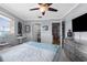 Comfortable bedroom with television, neutral walls, and calming decor at 4168 Harbor Blvd, Port Charlotte, FL 33952