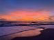 Breathtaking sunset view over the ocean with waves reflecting pinks and oranges at 4168 Harbor Blvd, Port Charlotte, FL 33952