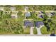 Aerial view showcasing the home's location, fenced-in backyard, swimming pool, and surrounding community at 4331 Marcella Ter, North Port, FL 34286