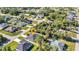 Discover this home's prime location with lush greenery and well-maintained landscaping, seen from above at 4331 Marcella Ter, North Port, FL 34286