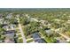 Birds-eye view of a residential community featuring single-Gathering homes and mature trees at 4331 Marcella Ter, North Port, FL 34286