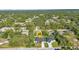 Discover this charming neighborhood with lush trees and manicured lawns from an aerial perspective at 4331 Marcella Ter, North Port, FL 34286