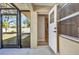 Entry from screened porch leads to bathroom at 4331 Marcella Ter, North Port, FL 34286