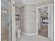 Bright bathroom featuring a glass door shower, white toilet, and neutral color scheme at 4331 Marcella Ter, North Port, FL 34286
