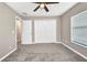 Neutral bedroom featuring a closet, carpet, and window at 4331 Marcella Ter, North Port, FL 34286