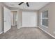 Neutral bedroom featuring carpet floors, a ceiling fan, and a closet at 4331 Marcella Ter, North Port, FL 34286