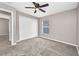 Neutral bedroom featuring a closet, carpet, and window at 4331 Marcella Ter, North Port, FL 34286