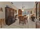 Inviting dining room featuring wood furniture and sunny views to the back yard at 4420 Larkspur Ct, Port Charlotte, FL 33948