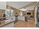 Bright kitchen with white cabinetry and an open layout, perfect for cooking and entertaining at 4420 Larkspur Ct, Port Charlotte, FL 33948