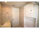 Bathroom featuring vintage fixtures with a sink and storage cabinet at 458 Azalea Nw Ave, Port Charlotte, FL 33952