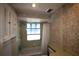 Vintage bathroom featuring a tub and shower combination at 458 Azalea Nw Ave, Port Charlotte, FL 33952