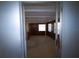 Light filled sunroom with wood paneled walls and beamed ceiling at 458 Azalea Nw Ave, Port Charlotte, FL 33952
