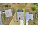Aerial view of the property highlighting the pool, backyard, and surrounding neighborhood at 474 Rio De Janeiro Ave, Punta Gorda, FL 33983