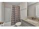 Bathroom featuring a vanity, toilet, and shower with a decorative shower curtain at 474 Rio De Janeiro Ave, Punta Gorda, FL 33983