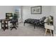 Bedroom featuring a desk, carpeted floors, and a Monopoly-themed poster at 474 Rio De Janeiro Ave, Punta Gorda, FL 33983