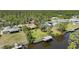 Waterfront property featuring a private dock and scenic water views at 552 Mccabe St, Port Charlotte, FL 33953