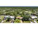 Peaceful waterfront property offers canal access, backyard dock and lush trees and landscaping at 552 Mccabe St, Port Charlotte, FL 33953