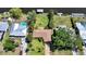Waterfront home with lush landscaping, private boat dock, and convenient canal access at 552 Mccabe St, Port Charlotte, FL 33953