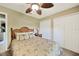Relaxing bedroom with a ceiling fan and double closet at 552 Mccabe St, Port Charlotte, FL 33953