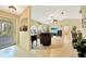 Inviting living room with neutral tones, arched windows, and a comfortable seating arrangement at 552 Mccabe St, Port Charlotte, FL 33953