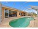 Relaxing screened-in pool area with spillover spa and ample lounge space at 624 Planters Manor Way, Bradenton, FL 34212