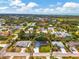 Charming single-story home with a well-maintained lawn and mature trees in a quiet residential neighborhood near the water at 1137 Ponderosa Rd, Venice, FL 34293